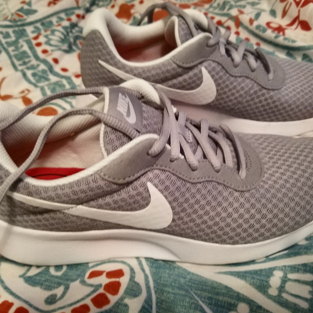 Nike women's size 8 1/2 gray shoes. Worn a couple times great condition!